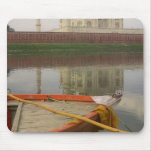 Canoe in water with Taj Mahal, Agra, India Mouse Pad