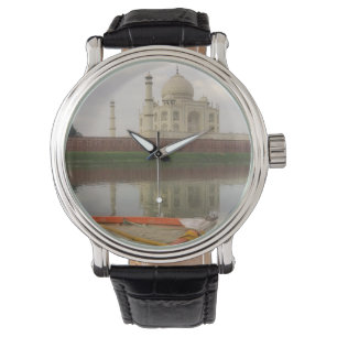 Canoe in water with Taj Mahal, Agra, India Watch