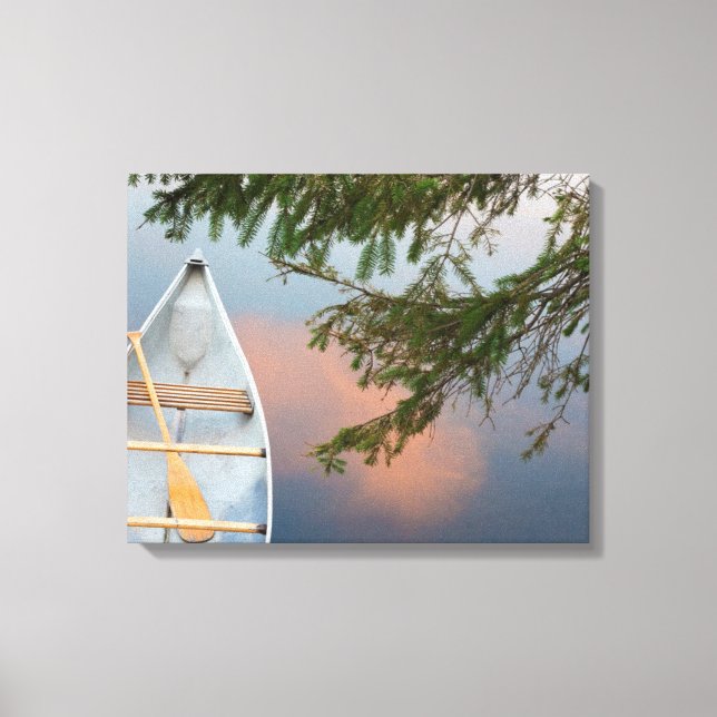 Canoe on lake at sunset, Canada Canvas Print (Front)