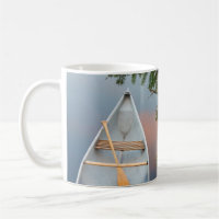 Canoe on lake at sunset, Canada