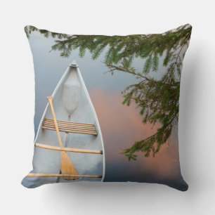 Canoe on lake at sunset, Canada Throw Pillow