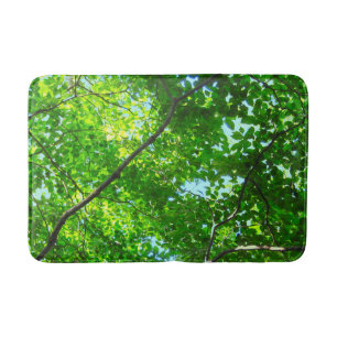 Canopy of Green, Leafy Branches with Blue Sky Bath Mat