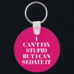 Can't Fix Stupid Keychain<br><div class="desc">Round button keychain features text "I Can't Fix Stupid, But I Can Sedate It" on a hot pink background or any colour you choose, perfect for a paramedic, nurse, or doctor. Keychains make fun gifts for family and friends or create for yourself.</div>