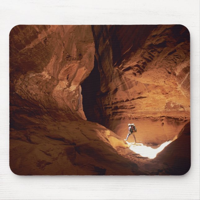 Canyoneer illuminated in the depths of a narrow mouse pad (Front)