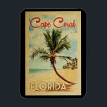 Cape Coral Palm Tree Vintage Travel Magnet<br><div class="desc">A uniquely retro mid-century modern Cape Coral Florida art print in vintage travel poster style. It features a curved palm tree on sandy beach with ocean under a blue cloudy sky.</div>