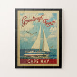 Cape May Sailboat Vintage Travel New Jersey Jigsaw Puzzle<br><div class="desc">This Greetings From Cape May New Jersey vintage travel nautical design features a boat sailing on the water with seagulls and a blue sky filled with gorgeous puffy white clouds.</div>