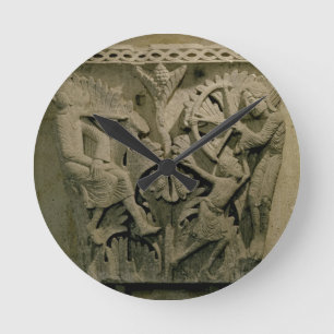 Capital depicting a man shooting an arrow into the round clock