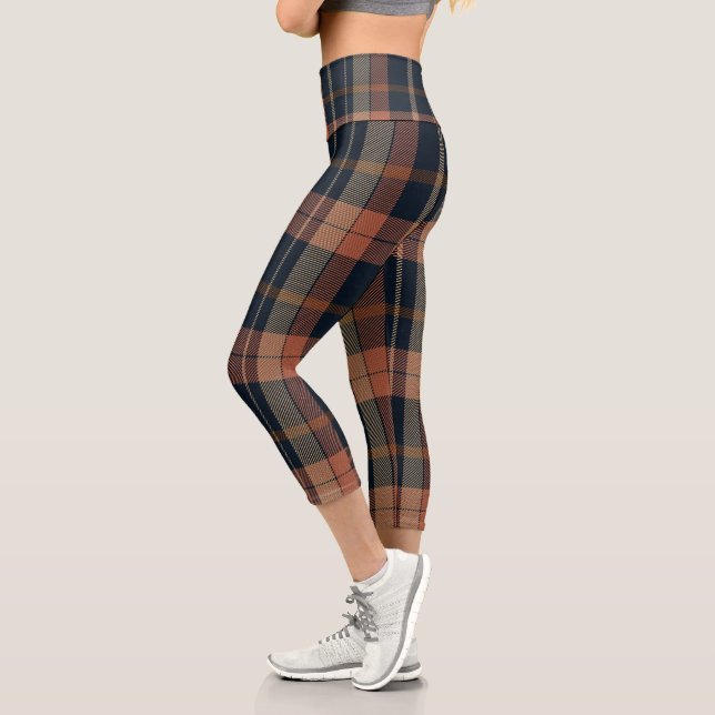 Capri Leggings plaqués orange et noir pour un confort él (Gauche)
