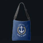Captain Your Boat Name Anchor Gold Laurel Navy Crossbody Bag<br><div class="desc">A stylish cross-body tote bag with Captain or other title, your personalized name, boat name or other desired text. Features a custom designed nautical boat anchor with gold style laurel leaves and star on navy blue. Easily customize the base colour to match your current decor or theme. Reusable and great...</div>