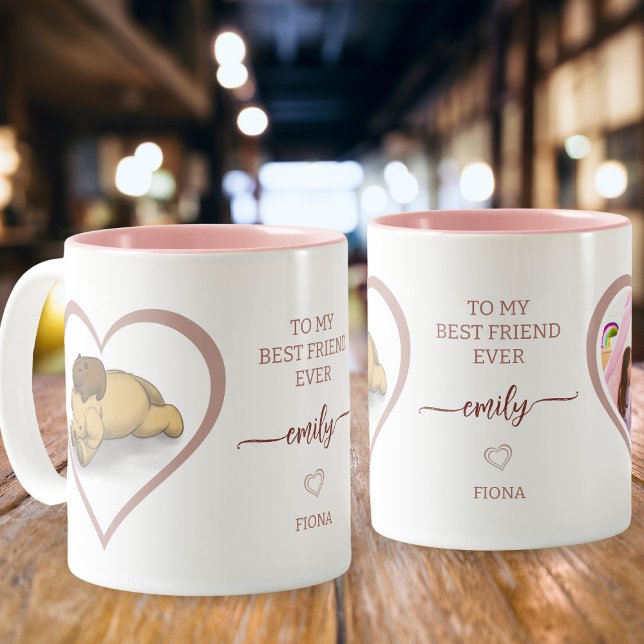 Capybara and Puppy Pink Love Frame Photo Two-Tone Coffee Mug (Cherish your best friend with this heartwarming capybara and puppy coffee mug.)