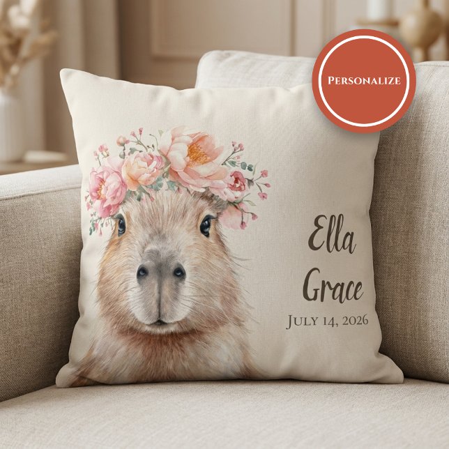 Capybara Baby Nursery • Personalized  Throw Pillow (soft nursery pillow with floral capybara illustration on beige sofa setting)
