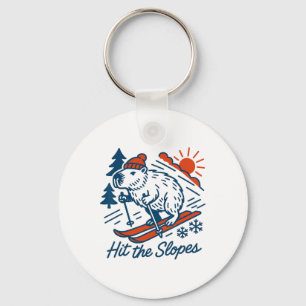 Capyra Shredding The Slopes Winter Mountain Skiing Keychain