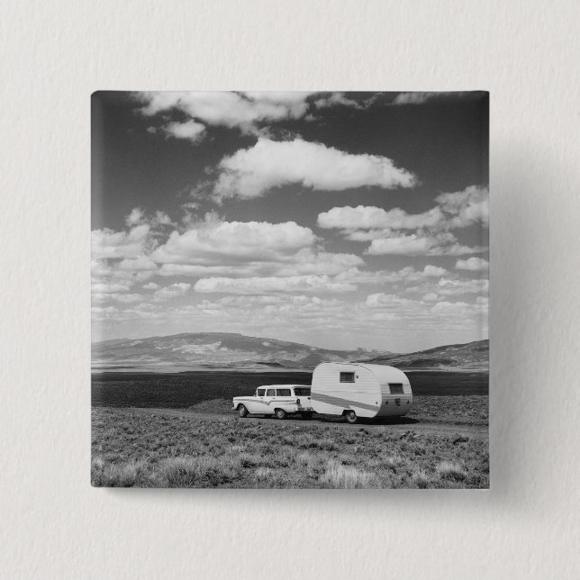 Car pulling trailer on road 2 inch square button (Front)