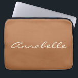 Caramel Brown Script Name Minimalist Personalized Laptop Sleeve<br><div class="desc">This laptop sleeve features a warm caramel brown background with a name in flowing cream script right across the front — simple, personal, and really easy to spot in a bag. It's a great gift for a college student, a new grad, or really anyone who wants their laptop to feel...</div>