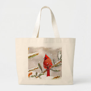 Cardinal in a pine tree in winter large tote bag