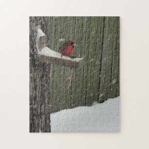 Cardinal in the snow jigsaw puzzle