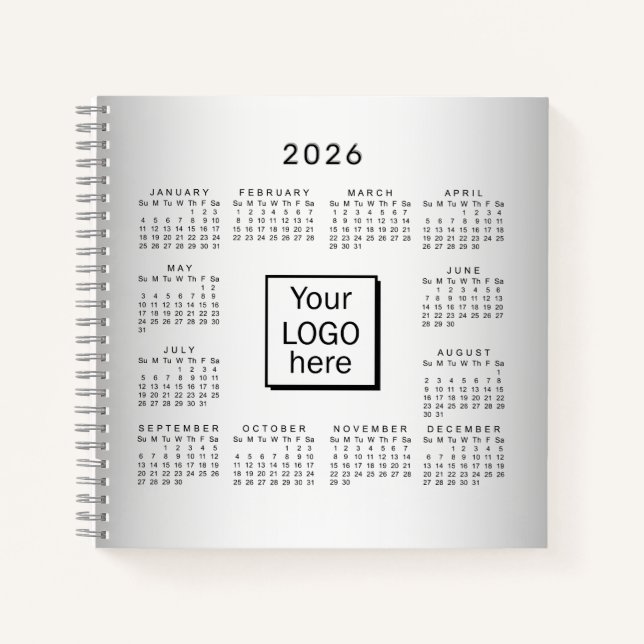 Carnet Calendrier 2026 sur fond gris flou avec logo perso (Devant)