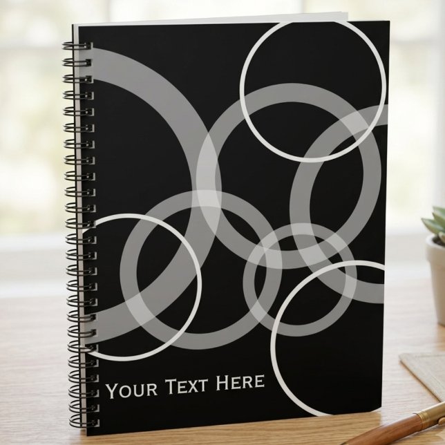 Carnet Cercles superposés noir et blanc modernes (A modern black and white circle pattern spiral notebook for students or office workers to use daily.)
