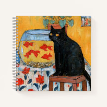 Chat noir curieux regardant un aquarium