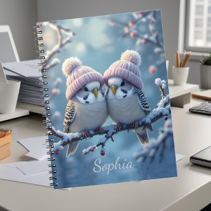 Carnet De jolis perruches avec des bonnets à pompon sur u