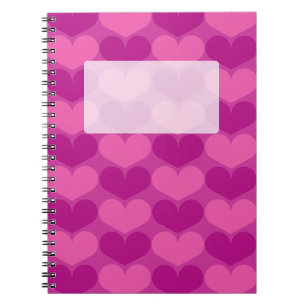 Carnet de notes à spirale avec le motif rose