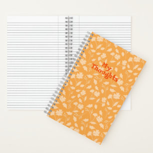 Carnet Des motifs floraux doux d'un arrière - plan orange