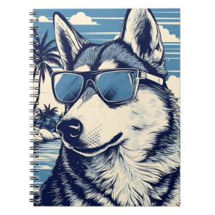 Carnet Husky avec lunettes de soleil à la plage