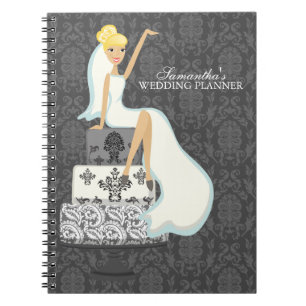 Carnet Jeune mariée blonde sur le gâteau de mariage