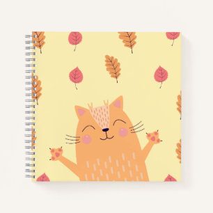 Carnet Joli chat orange roux jouant dans les feuilles d'a