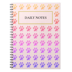 Carnet Motif patte multicolore sur rose
