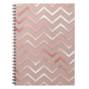Carnet or rose : élégant motif vintage.