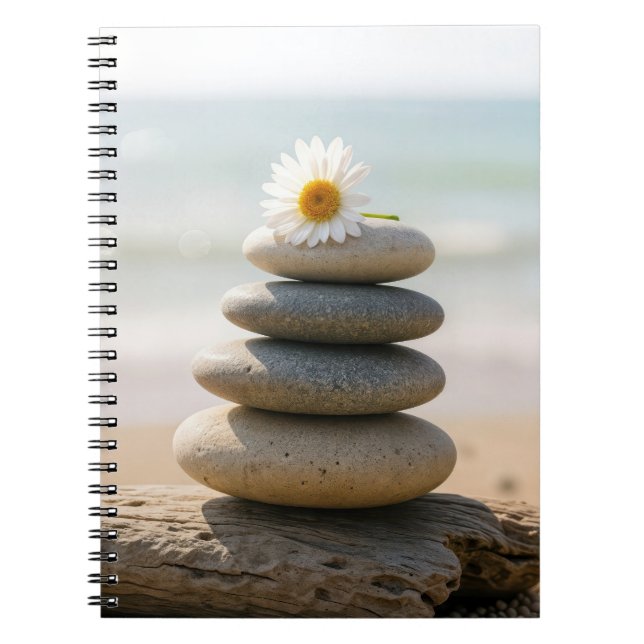 Carnet Pâquerette sur un cairn de plage en pierre avec bo (Devant)