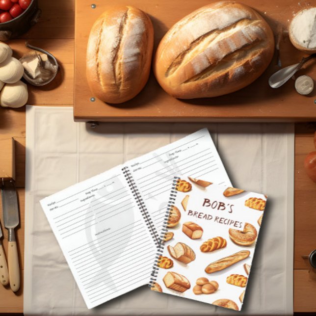 Carnet Recette de pain personnalisée (A bread making recipe book lies on top of a kitchen counter surrounded by bread and supplies.)