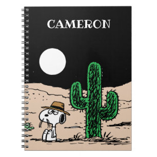 Carnet Spike dans un désert illuminé par la Lune