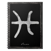 Symbole d'astrologie stylisée en argent martelé