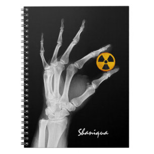 Carnet Tenir à la main un symbole de rayonnement