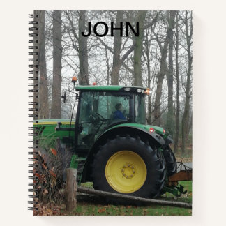 Carnet tracteur vert et jaune.