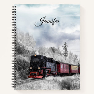 Carnet Train vintage traversant le paysage hivernal