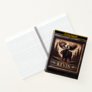 Carnet Un orignal majestueux taillé dans un panneau en bo