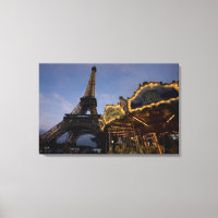 Carousel by the Eiffel Tower in the evening,