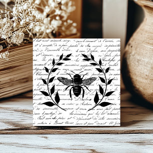 Carreau Abeille avec couronne de laurier et écriture franç