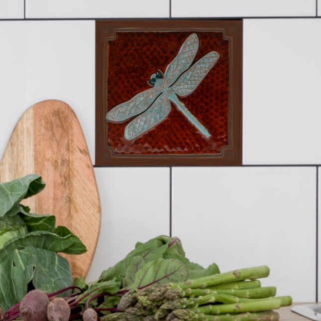 Carreau Carrelage de libellules de l'artisan, Brown et tur (Brown and turquoise dragonfly tile shown in a kitchen with  white tiles.)