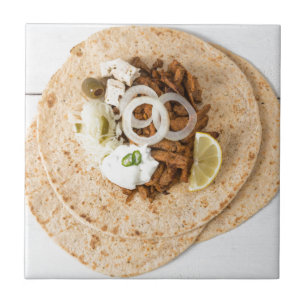 Carreau Gyros pita with tzatziki coleslaw olives and feta