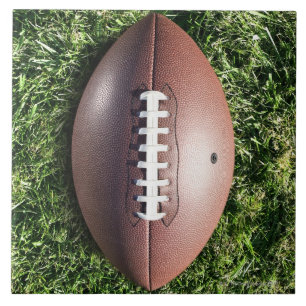 Carreau Le football sur l'herbe