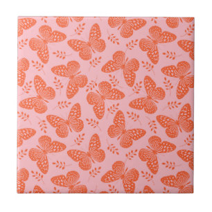 Carreau Motif papillon orange sur arrière - plan rose