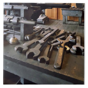 Carreau Poussettes et huile dans la machine Shop