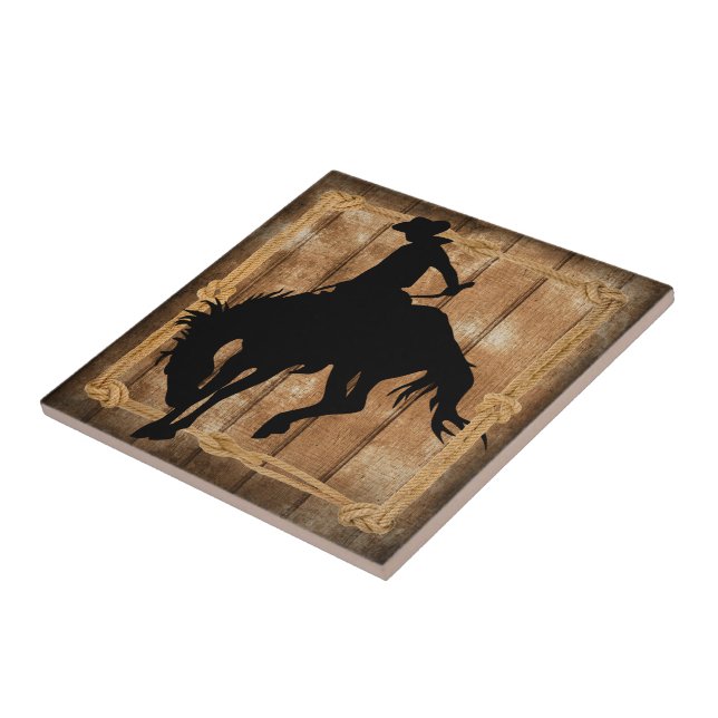 Carreau Silhouette Cowboy sur un cheval Bronco Bucking (Côté)
