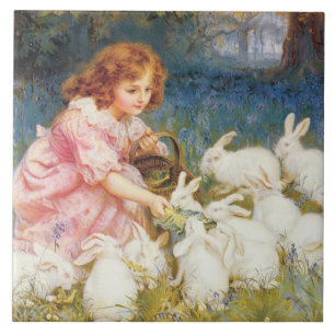 Carreau Une fille nourrit les lapins (par Frederick Morgan