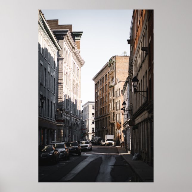 CARS PARKED ON SIDE OF THE ROAD IN BETWEEN BUILDIN POSTER (Front)