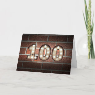 Carte 100e anniversaire éclairage marquee sur mur